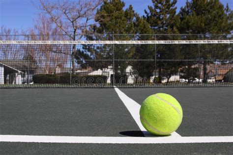 Close Up of Tennis Ball on Court Stock Photo - Image of sphere, green ...