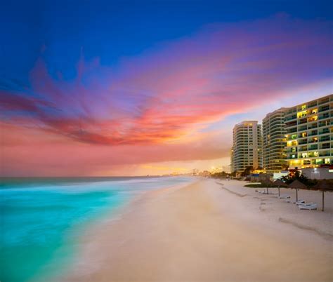 Premium Photo | Cancun forum beach sunset in mexico