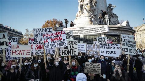 Protesters clash with police at Paris protest against police violence ...