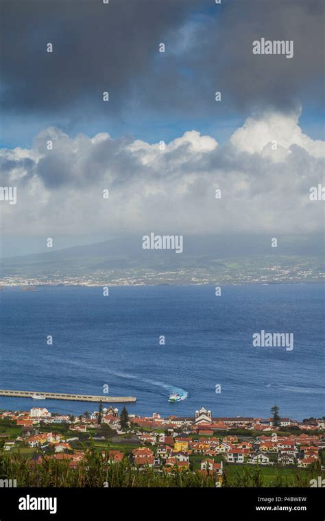 Portugal, Azores, Faial Island, Horta, elevated town view with Pico Volcano from Monte Carneiro ...