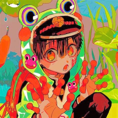 an anime character with big eyes and a frog hat on his head, holding something in one hand