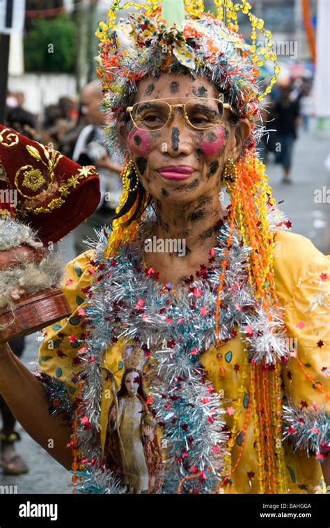 Filipina woman in sparkly costume at the Ati-Atihan festival in Kalibo, Philippines Stock Photo ...