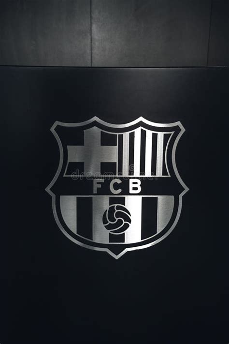 Vertical Closeup of the Logo of FC Barcelona on a Black Background in ...