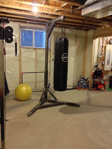 how to build a punching bag stand | Home gym garage, Home gyms ideas garage, Punching bag stand