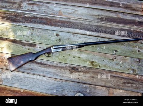 Antique 12 gauge side by side double barreled shotgun Stock Photo - Alamy