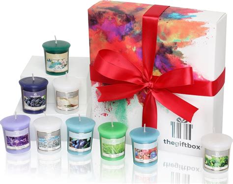 An Exclusive Luxury Gift Set Containing 9 Scented Candles in a Premium ...