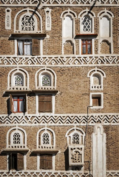 Traditional Yemeni heritage architecture design details in historic Sanaa old town buildings in ...