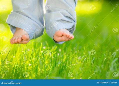 2,703 Baby Barefoot Grass Stock Photos - Free & Royalty-Free Stock ...