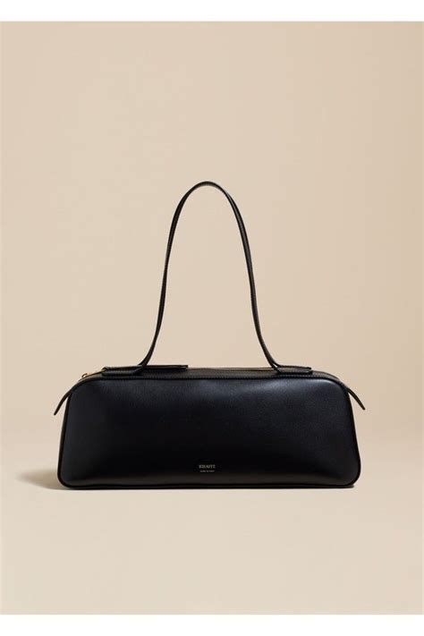 The Simona Shoulder Bag In Black Leather by Khaite in 2024