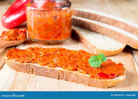 Ajvar on the bread stock photo. Image of healthy, blue - 34092010