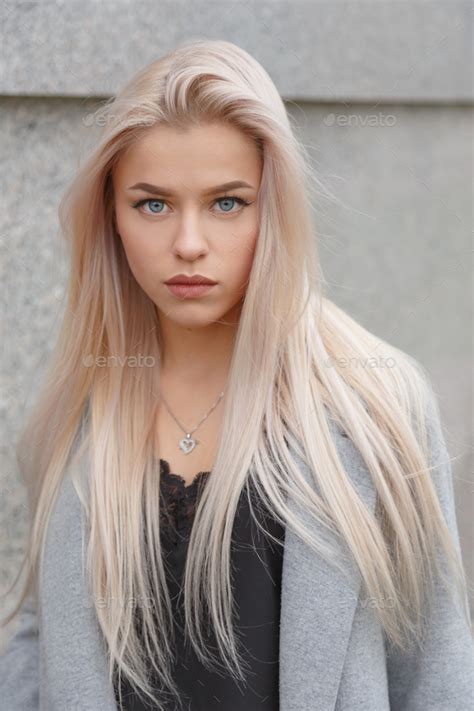 Stunning blue eyed blond woman, portrait Stock Photo by Vladdeep ...