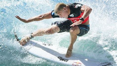 Mick Fanning defeats fellow Australian surfer Matt Banting in second ...