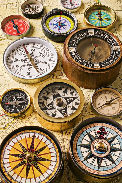 Assorted Compasses Photograph by Garry Gay