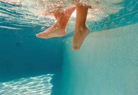 Detail Of Kid Feet On A Swimming Pool Stock Photo - Download Image Now ...