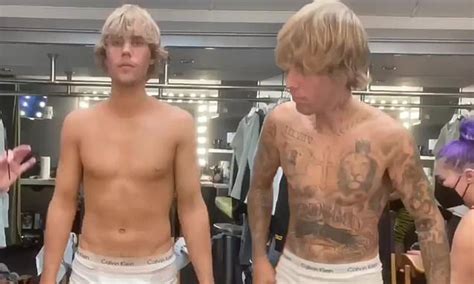 Justin Bieber shows off tattoo removal process in a pair of white ...