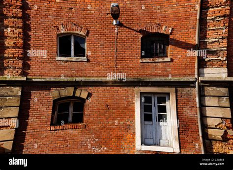 Facade of abandoned factory, Rijeka, Croatia (Pincushion distortion Stock Photo, Royalty Free ...