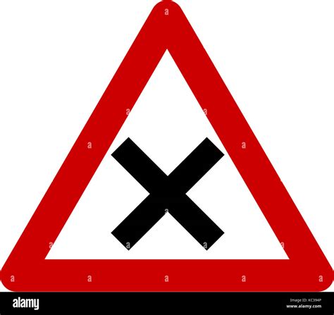 Warning sign with intersection symbol Stock Photo - Alamy