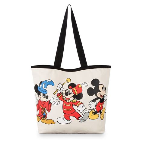 Mickey Mouse Through the Years Canvas Tote Bag | Disney tote bags, Tote ...