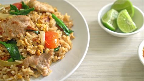 fried rice with pork and mix vegetables 4811989 Stock Video at Vecteezy