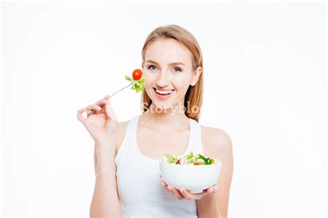 Woman eating healthy food Royalty-Free Stock Image - Storyblocks