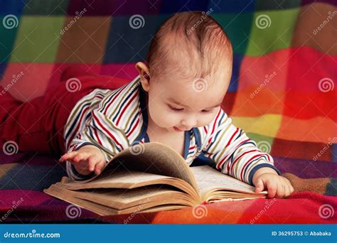 Cute Little Baby Reading Book Stock Image - Image of person, infant: 36295753