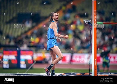 Gianmarco Tamberi participating in the high jump at the 2022 European ...