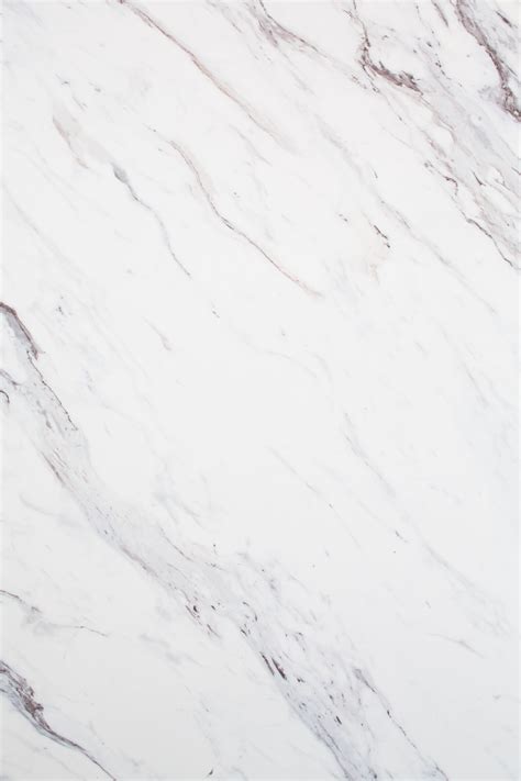 Great cheap marble substitute for photography. Wilsonart Calcutta Marble Textured Gloss Laminate ...