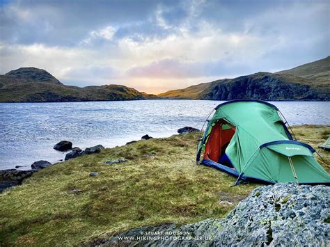 Wild camping in the Lake District at Angle Tarn, one of the most popular spots in the Lakes ...