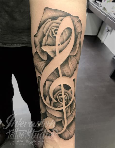 Treble Clef Rose Tattoo – INKVASION Tattoo Studio · SINGAPORE