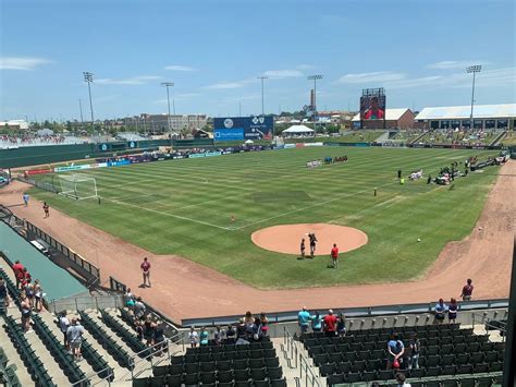 Guys behind the grass: Baseball to soccer field transition at Legends Field a thankless ...