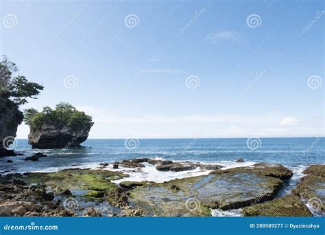 Sawarna beach stock image. Image of greenery, dotted - 288589277