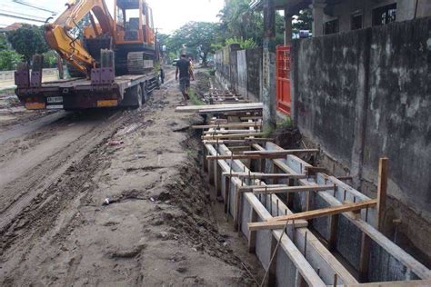 Inspecting the Ongoing upgrading of Road and Construction of Drainage System