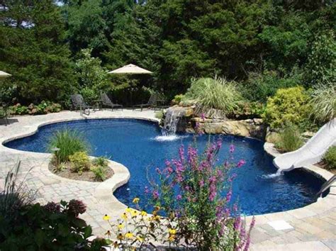 CUSTOM DESIGN SWIMMING POOLS & IN GROUND HOT TUB DESIGNS