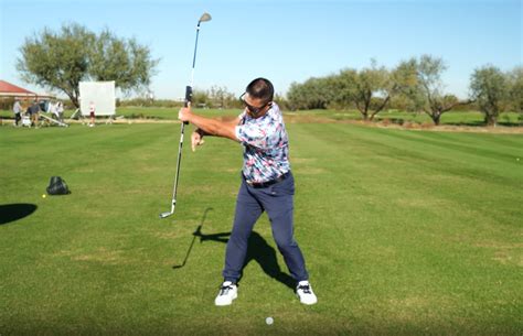 This 2-club drill will help improve your swing plane for straighter shots