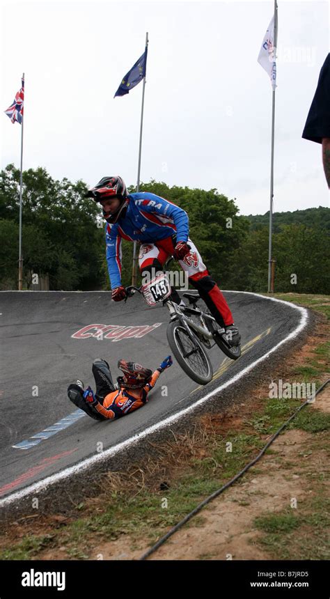 Bike racing accident Stock Photo - Alamy