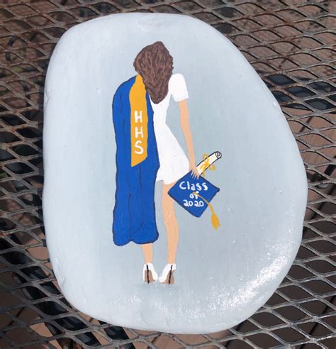 Graduation painted rock | Painted rocks, Rock