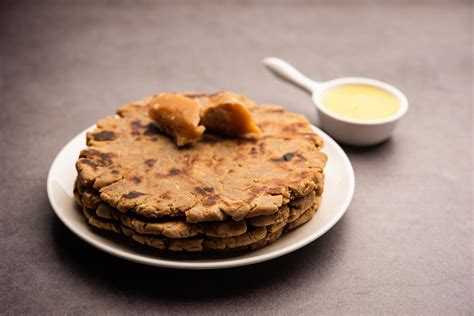 Sweet roti made out of rice flour, jaggery, and ghee. Gud ki roti. gur ...