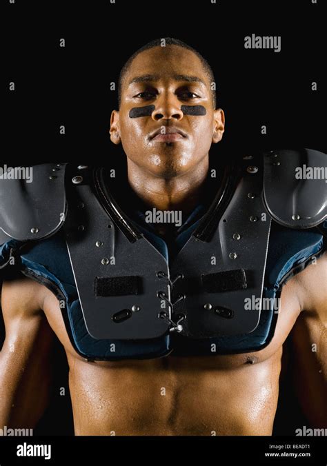 African football player wearing protective pads Stock Photo - Alamy