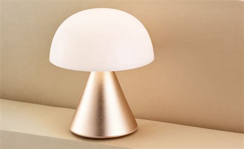 This mini LED lamp provides a soft, warm bedside light