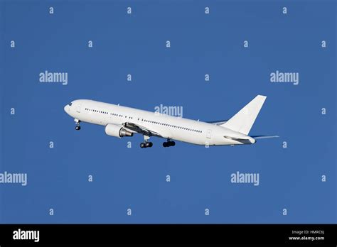 Boeing 767-300ER taking off from the airport Stock Photo - Alamy