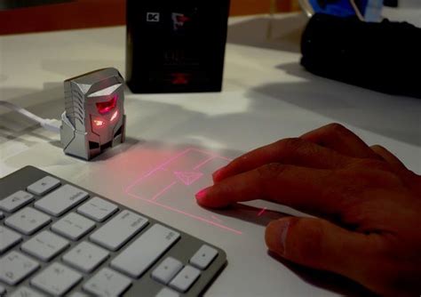 This virtual mouse uses lasers to meld trackpad and touchscreen functions | PCWorld