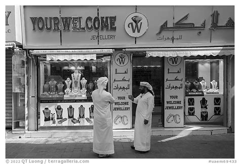Black and White Picture/Photo: Men in front of jewellery, Gold Souk, Deira. United Arab Emirates