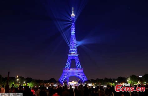 Eiffel Tower in laser and strobe light show for 130th birthday