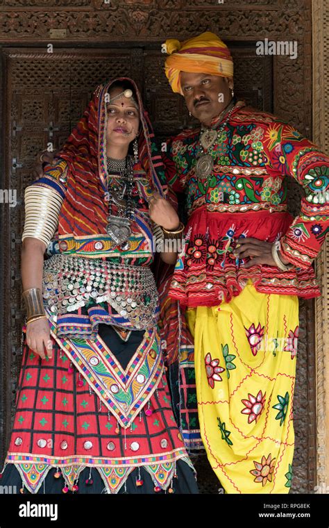 Couple standing together in traditional Rajasthani costume, Jaisalmer ...