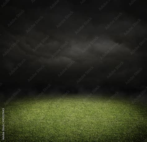 Soccer or football field at night with copy space Stock Photo | Adobe Stock