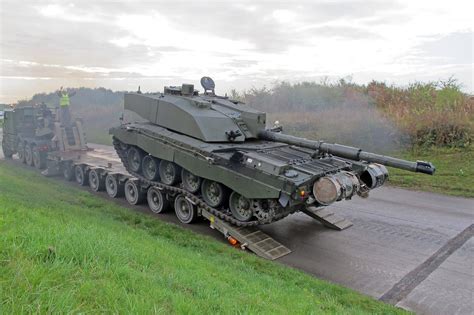 Challenger 2 tanks are loaded ready for being transported to Poland for EXERCISE Black Eagle ...