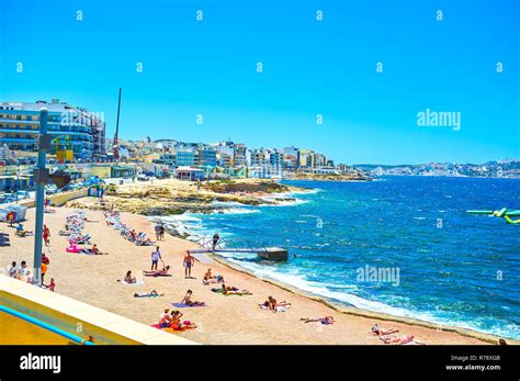 BUGIBBA, MALTA - JUNE 14, 2018: The Bugibba Perched Beach is one of the best in the city with ...