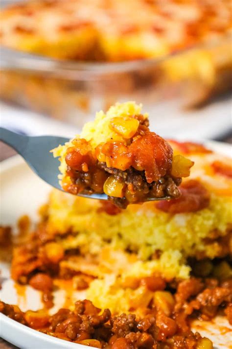 Cowboy Cornbread Casserole is an easy ground beef casserole recipe loaded with bacon, baked be ...