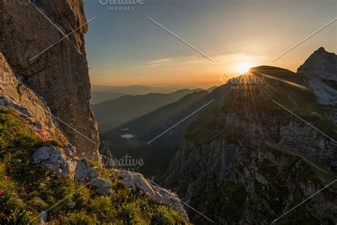 Sunrise in the mountains in Alps | High-Quality Nature Stock Photos ~ Creative Market