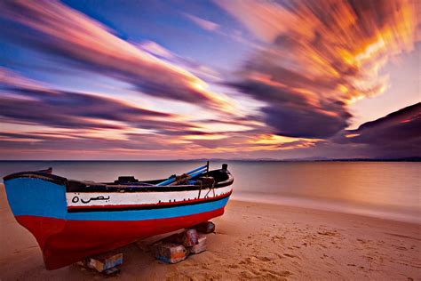 Fishing Boat On A Beach At Sunset / Hammamet Photograph by Barry O Carroll